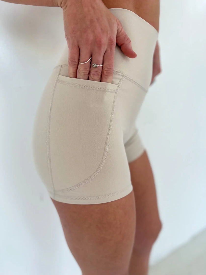 Amara Pocket Short - Virtuous Ivory - Wolfness Athletics