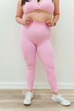 Petal Pink 7/8 leggings with a high-waist design, ideal for yoga and gym sessions.